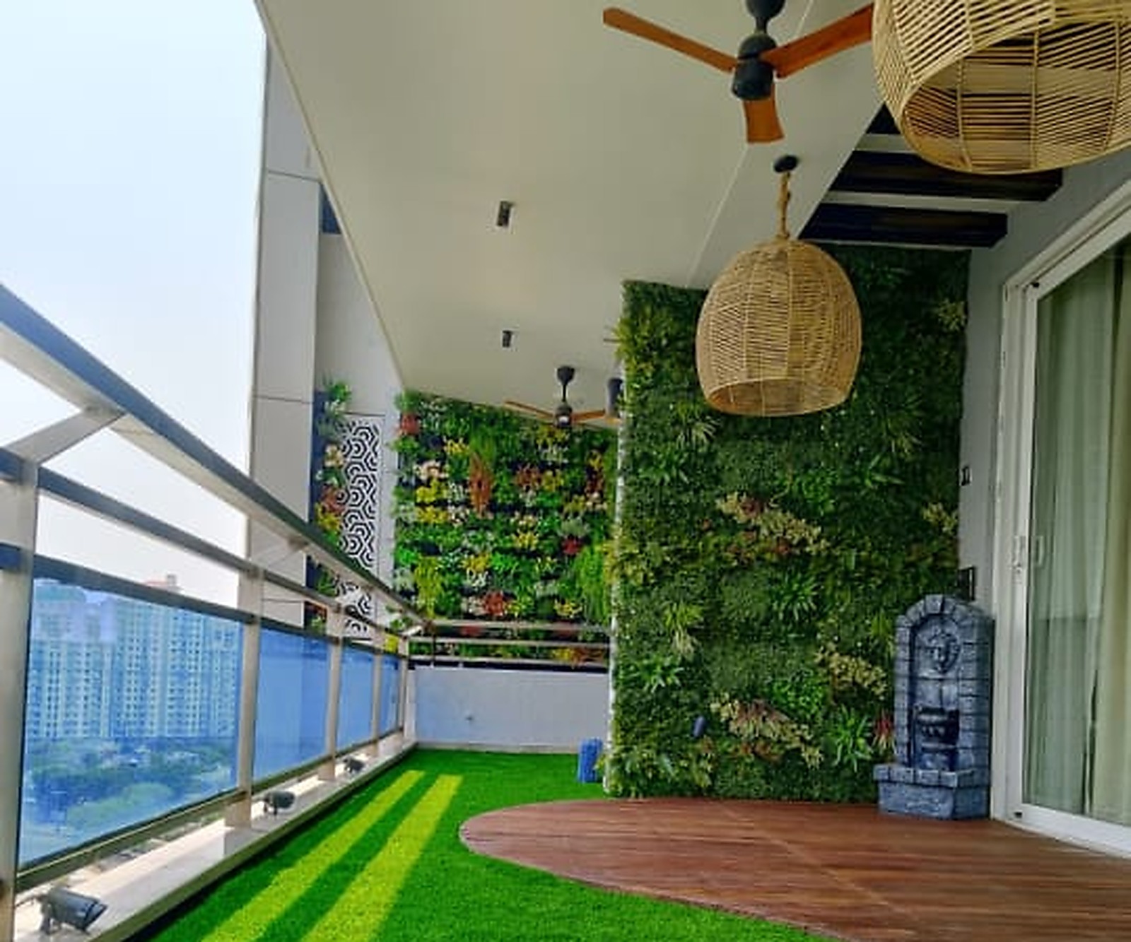 Balcony makeover with turf and vertical garden
